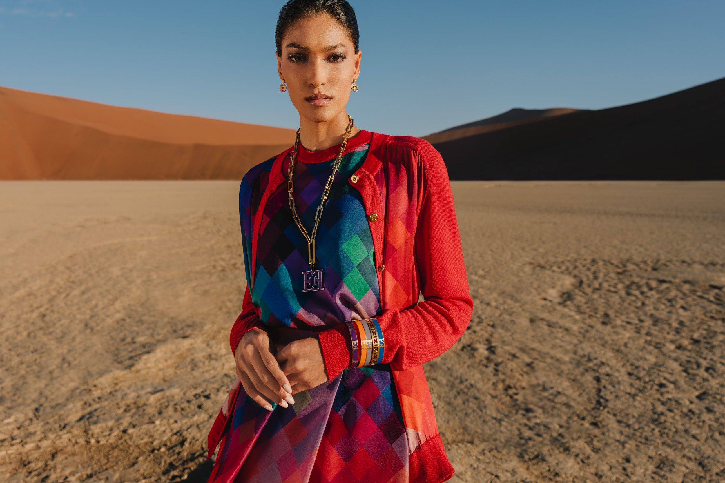 ESCADA jewelry: gold necklace and colorful bracelets on Pritika Swarup